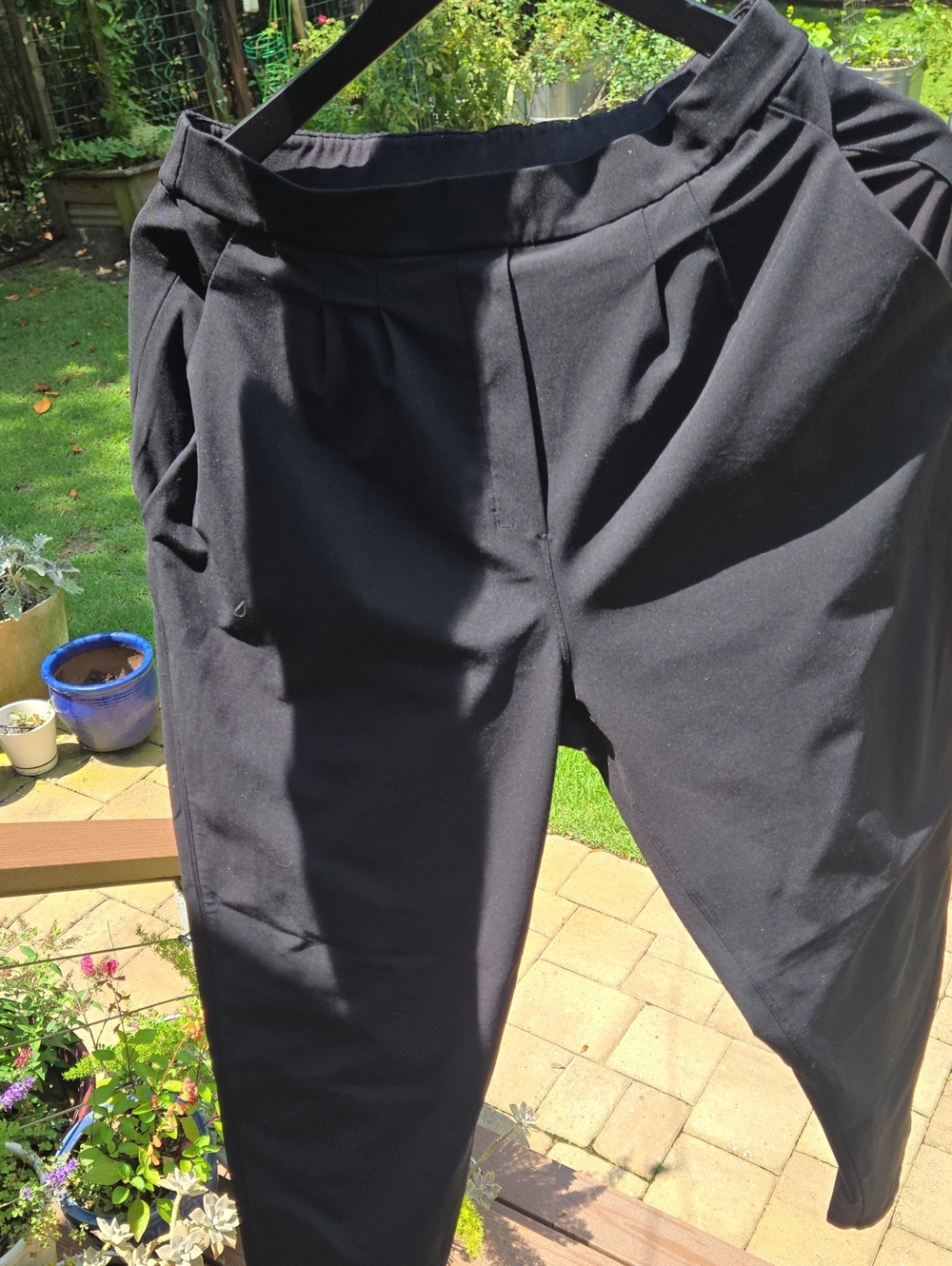 Lululemon Essential High-Rise Trouser in black.